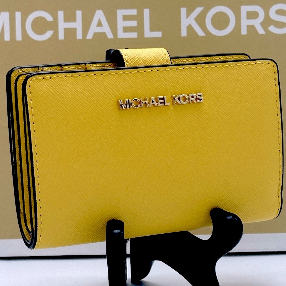 Michael Kors Jet Set Travel Medium Printed Signature Logo Bi-Fold Daisy Yellow